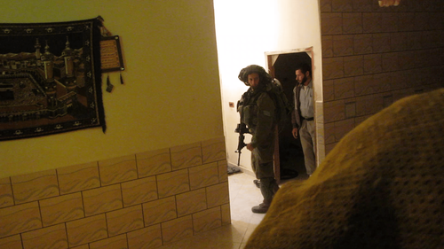 Soldiers entering in Palestinian houses, looking for 