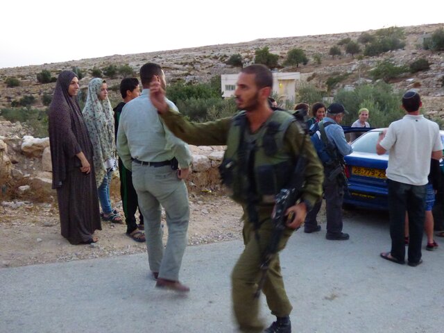 Soldier and settlers leaving