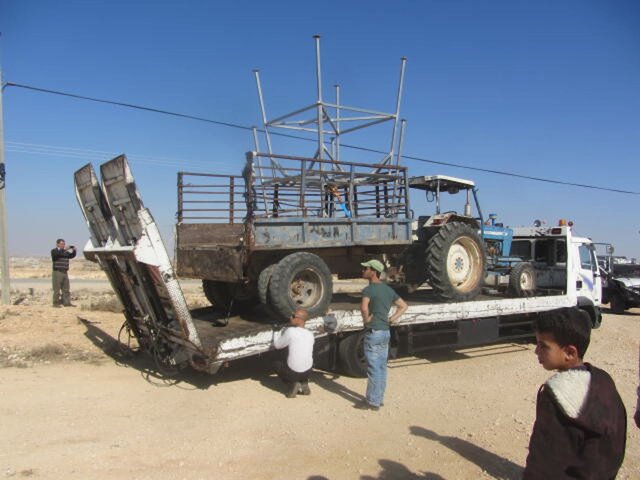Israeli forces seize tractor and new water tanks in the Palestinian village of Susiya, South Hebron Hills.