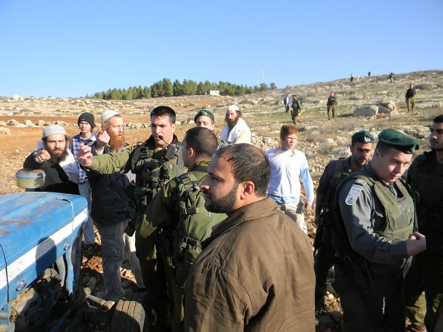 2011-01-22 Palestinian farmers plow fields despite settler harassment