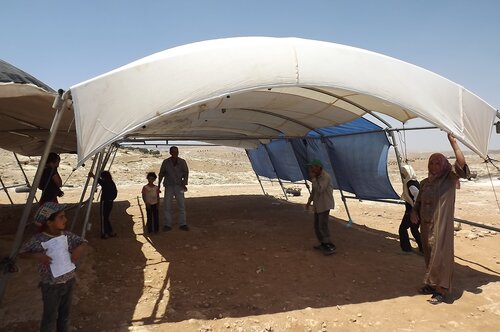 The tent under demolition order
